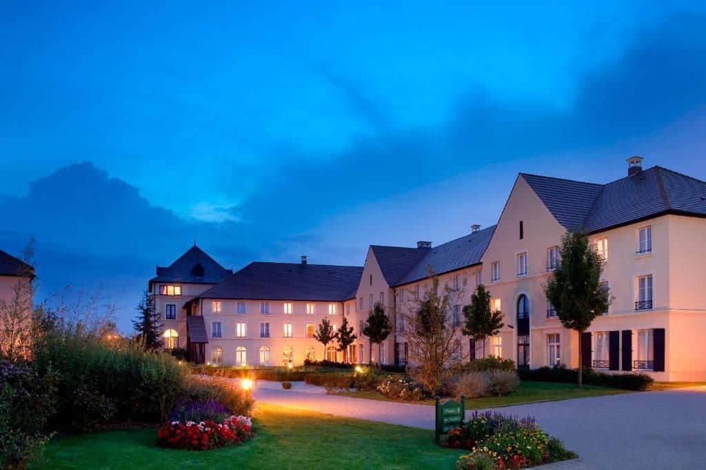 Outside view of the Campanile Val de France Hotel at night. One of the best family Hotels near Disneyland Paris