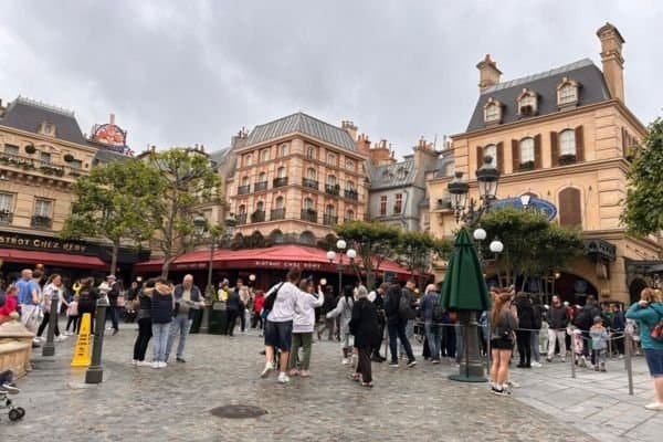 Lots of people in the Worlds of Pixar outside Bistrot Chez Remy Disneyland Paris